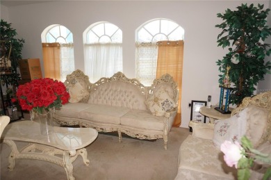 Impressive 4 Bedroom, 3 Bathroom POOL HOME with attached 2 Car on Deep Creek Golf Club in Florida - for sale on GolfHomes.com, golf home, golf lot