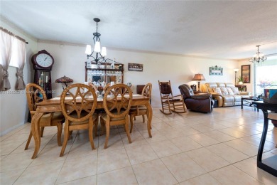 Charming one-bedroom, one and a half-bath condo in Hollybrook, a on Hollybrook Golf and Tennis Club  in Florida - for sale on GolfHomes.com, golf home, golf lot