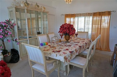 Impressive 4 Bedroom, 3 Bathroom POOL HOME with attached 2 Car on Deep Creek Golf Club in Florida - for sale on GolfHomes.com, golf home, golf lot
