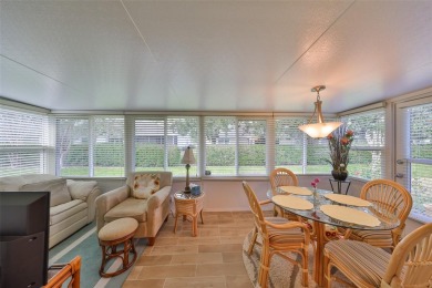 TERRIFIC PRICE IMPROVEMENT FOR THIS BEAUTIFULLY UPDATED CONDO on Scepter Golf Club in Florida - for sale on GolfHomes.com, golf home, golf lot