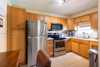 Charming one-bedroom, one and a half-bath condo in Hollybrook, a on Hollybrook Golf and Tennis Club  in Florida - for sale on GolfHomes.com, golf home, golf lot