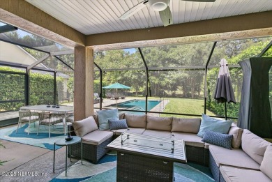 Outdoors is where you'll truly live in this gorgeous pool home on St. Johns Golf and Country Club in Florida - for sale on GolfHomes.com, golf home, golf lot