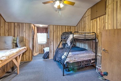 Stunning 5BR, 2.5BA golf course home with lake views on Hole #14 on Lake Kiowa Golf Course in Texas - for sale on GolfHomes.com, golf home, golf lot