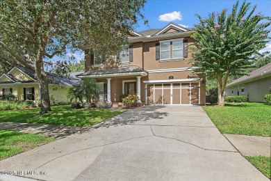 Outdoors is where you'll truly live in this gorgeous pool home on St. Johns Golf and Country Club in Florida - for sale on GolfHomes.com, golf home, golf lot