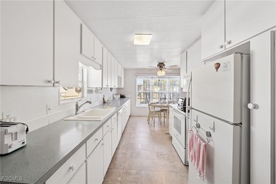 A great example of an affordable, well-cared-for, property in on Six Lakes Country Club in Florida - for sale on GolfHomes.com, golf home, golf lot