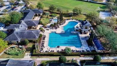 Outdoors is where you'll truly live in this gorgeous pool home on St. Johns Golf and Country Club in Florida - for sale on GolfHomes.com, golf home, golf lot