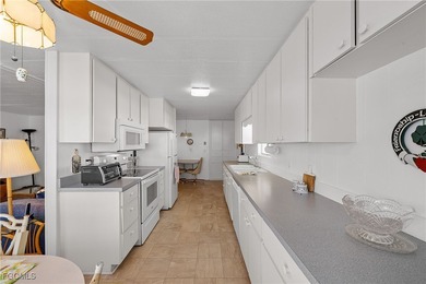 A great example of an affordable, well-cared-for, property in on Six Lakes Country Club in Florida - for sale on GolfHomes.com, golf home, golf lot