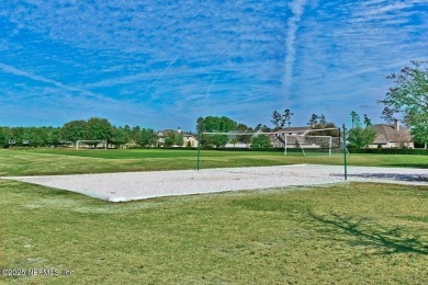 Outdoors is where you'll truly live in this gorgeous pool home on St. Johns Golf and Country Club in Florida - for sale on GolfHomes.com, golf home, golf lot