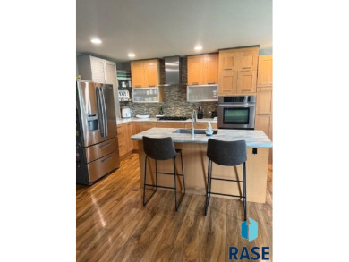 Step into this spacious 5 bedroom home offering an open floor on Wild Oak Golf Club in South Dakota - for sale on GolfHomes.com, golf home, golf lot