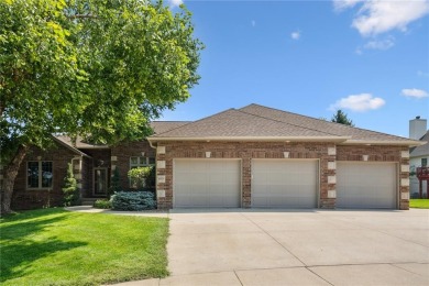 Welcome to a home where elegance meets everyday comfort on Brown Deer Golf Club in Iowa - for sale on GolfHomes.com, golf home, golf lot