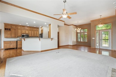 Welcome to a home where elegance meets everyday comfort on Brown Deer Golf Club in Iowa - for sale on GolfHomes.com, golf home, golf lot