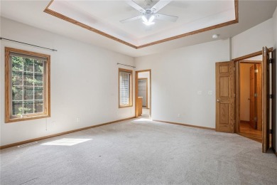 Welcome to a home where elegance meets everyday comfort on Brown Deer Golf Club in Iowa - for sale on GolfHomes.com, golf home, golf lot
