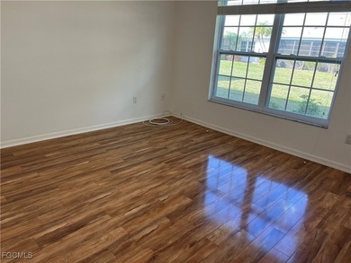 This spacious 3 bedroom unit features a gorgeous updated kitchen on Myerlee Country Club in Florida - for sale on GolfHomes.com, golf home, golf lot