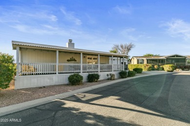 WELCOME TO THIS NICE 2040SQF HOME ON A SPACIOUS AND IDEAL CORNER on Paradise Peak Golf Course in Arizona - for sale on GolfHomes.com, golf home, golf lot