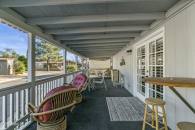 WELCOME TO THIS NICE 2040SQF HOME ON A SPACIOUS AND IDEAL CORNER on Paradise Peak Golf Course in Arizona - for sale on GolfHomes.com, golf home, golf lot