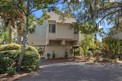Discover coastal charm in this beautifully updated two-bedroom on The Seabrook Island Club in South Carolina - for sale on GolfHomes.com, golf home, golf lot