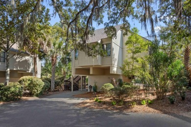 Discover coastal charm in this beautifully updated two-bedroom on The Seabrook Island Club in South Carolina - for sale on GolfHomes.com, golf home, golf lot