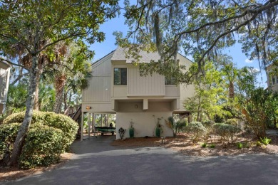 Discover coastal charm in this beautifully updated two-bedroom on The Seabrook Island Club in South Carolina - for sale on GolfHomes.com, golf home, golf lot