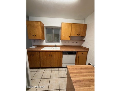 Charming 3-bedroom, 2-bath, two-story townhouse co-op located in on Randolph Park Golf Courses in Arizona - for sale on GolfHomes.com, golf home, golf lot