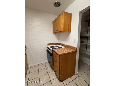 Charming 3-bedroom, 2-bath, two-story townhouse co-op located in on Randolph Park Golf Courses in Arizona - for sale on GolfHomes.com, golf home, golf lot