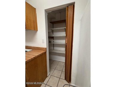 Charming 3-bedroom, 2-bath, two-story townhouse co-op located in on Randolph Park Golf Courses in Arizona - for sale on GolfHomes.com, golf home, golf lot