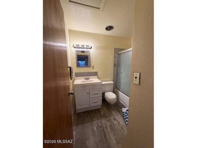 Charming 3-bedroom, 2-bath, two-story townhouse co-op located in on Randolph Park Golf Courses in Arizona - for sale on GolfHomes.com, golf home, golf lot