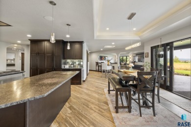 Luxury Living on Red Rocks Golf Course Modern elegance meets on Golf Club At Red Rock in South Dakota - for sale on GolfHomes.com, golf home, golf lot