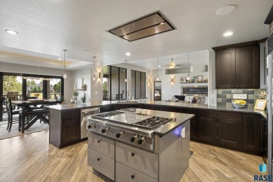 Luxury Living on Red Rocks Golf Course Modern elegance meets on Golf Club At Red Rock in South Dakota - for sale on GolfHomes.com, golf home, golf lot