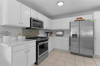 Under contract-accepting backup offers. Welcome to the Village on Glenview Championship Golf and Country Club in Florida - for sale on GolfHomes.com, golf home, golf lot