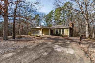 Welcome to this charming bungalow nestled in the heart of Hot on Cortez Golf Course in Arkansas - for sale on GolfHomes.com, golf home, golf lot