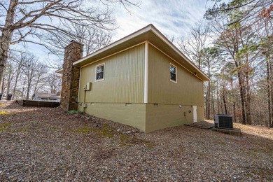 Welcome to this charming bungalow nestled in the heart of Hot on Cortez Golf Course in Arkansas - for sale on GolfHomes.com, golf home, golf lot