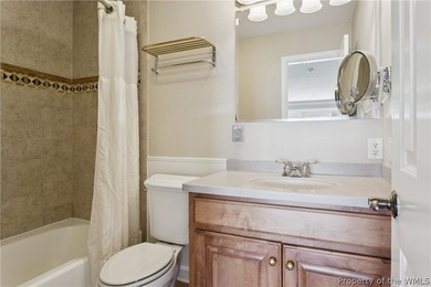 Enjoy peaceful James River views from your private balcony in on Kingsmill Resort and Golf Club in Virginia - for sale on GolfHomes.com, golf home, golf lot