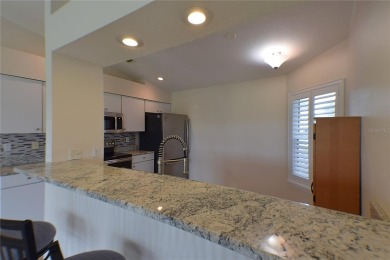 Enjoy resort-style living in the highly sought-after 55+ on Tampa Bay Golf and Country Club in Florida - for sale on GolfHomes.com, golf home, golf lot
