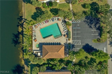 EXQUISITELY UPDATED 2BR/2BA CONDO WITH SUNNY LAKE VIEW & PLENTY on Colonial Country Club in Florida - for sale on GolfHomes.com, golf home, golf lot
