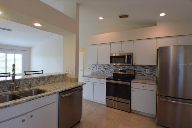 Enjoy resort-style living in the highly sought-after 55+ on Tampa Bay Golf and Country Club in Florida - for sale on GolfHomes.com, golf home, golf lot