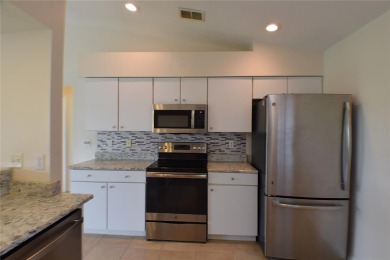 Enjoy resort-style living in the highly sought-after 55+ on Tampa Bay Golf and Country Club in Florida - for sale on GolfHomes.com, golf home, golf lot