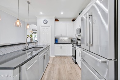Beautifully updated all-brick home located at the end of a on Magnolia Greens Golf Plantation in North Carolina - for sale on GolfHomes.com, golf home, golf lot