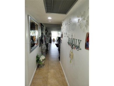 Beautifully 2-Bedroom, 2-Bath Condo with Golf Course Views - on Flamingo Lakes Country Club in Florida - for sale on GolfHomes.com, golf home, golf lot