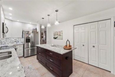 Step into luxury with this beautifully upgraded 2-bedroom + den on Worthington Country Club in Florida - for sale on GolfHomes.com, golf home, golf lot