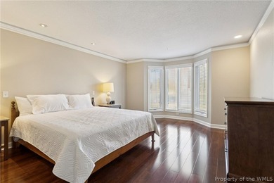 Enjoy peaceful James River views from your private balcony in on Kingsmill Resort and Golf Club in Virginia - for sale on GolfHomes.com, golf home, golf lot