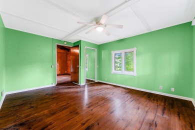Like something out of Storybook Forest- Tucked beneath a canopy on Paradise Lake Golf Course in West Virginia - for sale on GolfHomes.com, golf home, golf lot