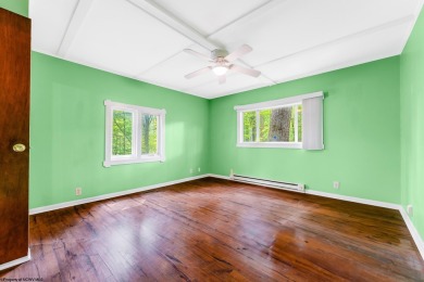 Like something out of Storybook Forest- Tucked beneath a canopy on Paradise Lake Golf Course in West Virginia - for sale on GolfHomes.com, golf home, golf lot