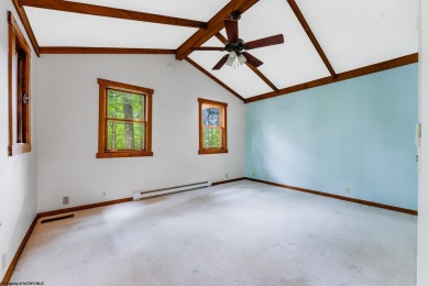 Like something out of Storybook Forest- Tucked beneath a canopy on Paradise Lake Golf Course in West Virginia - for sale on GolfHomes.com, golf home, golf lot