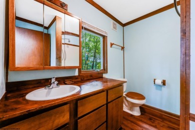 Like something out of Storybook Forest- Tucked beneath a canopy on Paradise Lake Golf Course in West Virginia - for sale on GolfHomes.com, golf home, golf lot