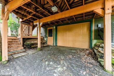 Like something out of Storybook Forest- Tucked beneath a canopy on Paradise Lake Golf Course in West Virginia - for sale on GolfHomes.com, golf home, golf lot