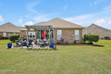 Beautifully updated all-brick home located at the end of a on Magnolia Greens Golf Plantation in North Carolina - for sale on GolfHomes.com, golf home, golf lot