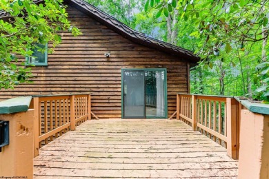 Like something out of Storybook Forest- Tucked beneath a canopy on Paradise Lake Golf Course in West Virginia - for sale on GolfHomes.com, golf home, golf lot