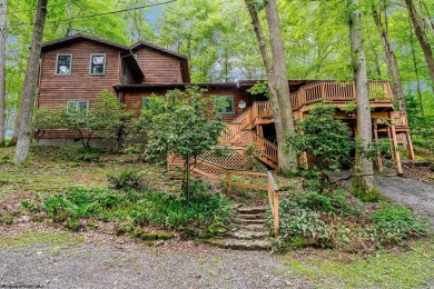 Like something out of Storybook Forest- Tucked beneath a canopy on Paradise Lake Golf Course in West Virginia - for sale on GolfHomes.com, golf home, golf lot