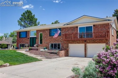 Tucked away with no rear neighbors, this home sits in the serene on Colorado Springs Country Club in Colorado - for sale on GolfHomes.com, golf home, golf lot