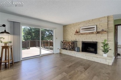 Tucked away with no rear neighbors, this home sits in the serene on Colorado Springs Country Club in Colorado - for sale on GolfHomes.com, golf home, golf lot